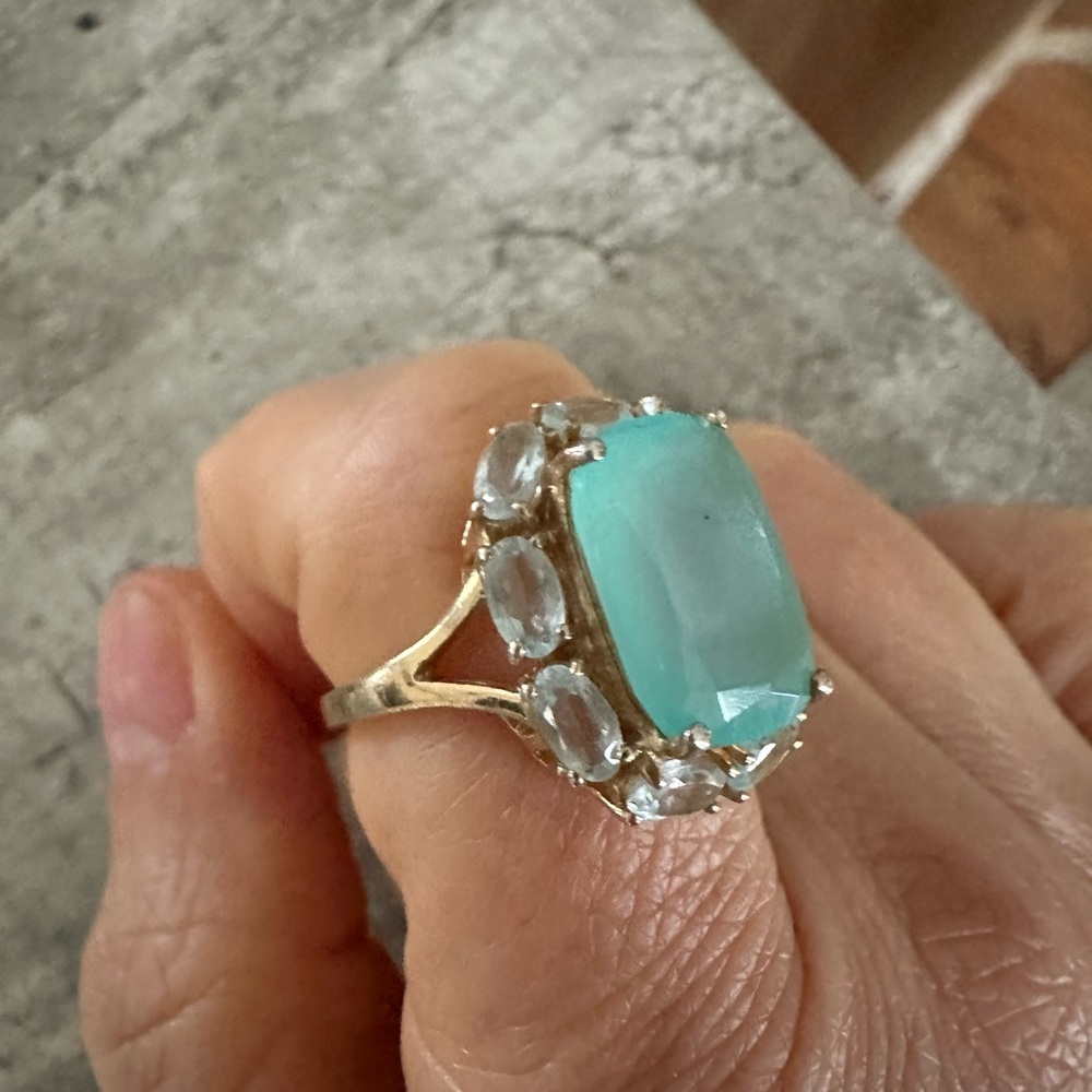 Gold Ring with Turquoise Blue Center Stone and Clear Accent Stones